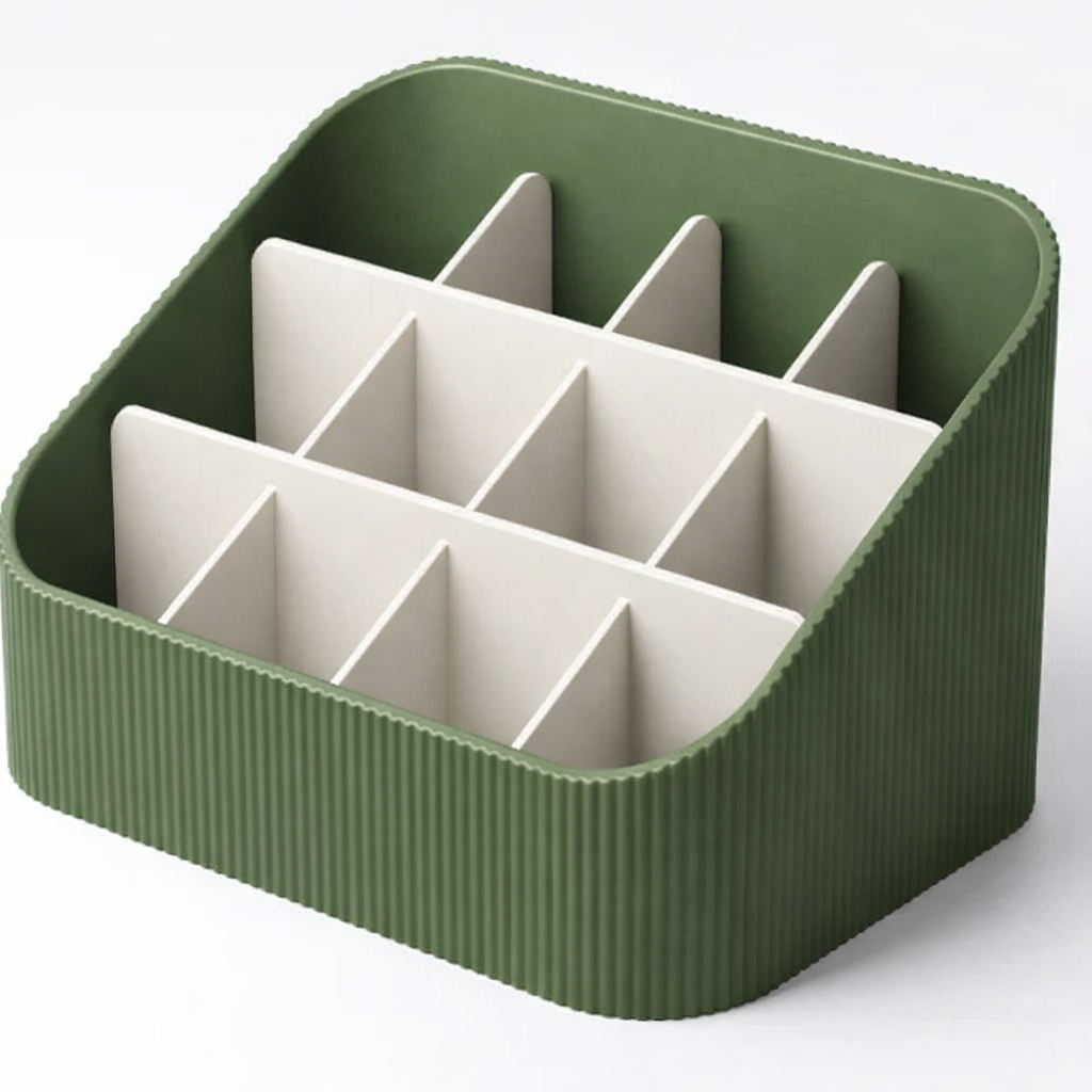 3D tiskan namizni organizator STACK GRID zelen z več razdelki za organizacijo